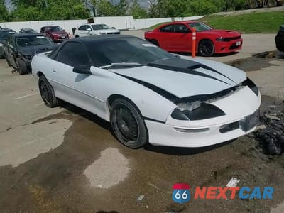 Zdjęcie 13 z 14 samochodu: 1996 CHEVROLET CAMARO Z28 VIN:2G1FP22P3T2128918 - miniatura