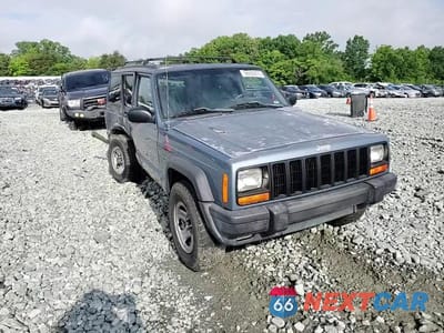 Zdjęcie 14 z 15 samochodu: 1998 JEEP CHEROKEE SPORT VIN:1J4FJ68S5WL110141 - miniatura