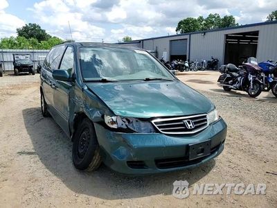 Zdjęcie 14 z 15 samochodu: 2002 HONDA ODYSSEY EX VIN:2HKRL18642H578492 - miniatura