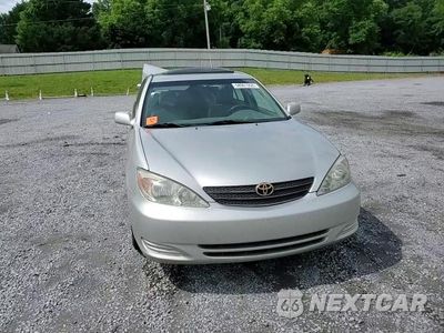 Zdjęcie 13 z 13 samochodu: 2002 TOYOTA CAMRY LE VIN:4T1BE32K22U634900 - miniatura
