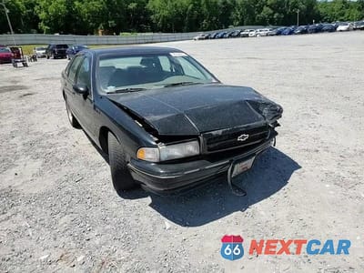 Zdjęcie 13 z 14 samochodu: 1994 CHEVROLET CAPRICE CLASSIC LS VIN:1G1BN52P0RR163380 - miniatura