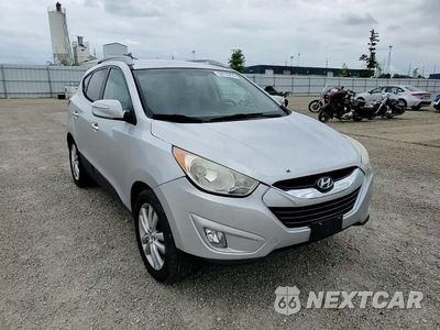 Zdjęcie 14 z 15 samochodu: 2013 HYUNDAI TUCSON GLS VIN:KM8JUCAC3DU560205 - miniatura
