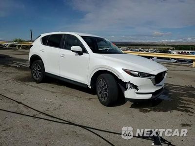 Zdjęcie 14 z 15 samochodu: 2018 MAZDA CX-5 TOURING VIN:JM3KFACM0J1473699 - miniatura