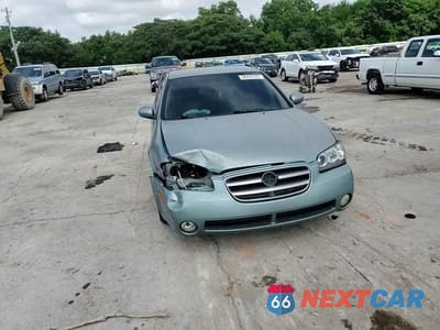 Zdjęcie 13 z 14 samochodu: 2002 NISSAN MAXIMA GLE VIN:JN1DA31D82T419008 - miniatura
