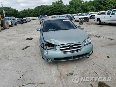 Zdjęcie 13 z 14 samochodu: 2002 NISSAN MAXIMA GLE VIN:JN1DA31D82T419008 - miniatura