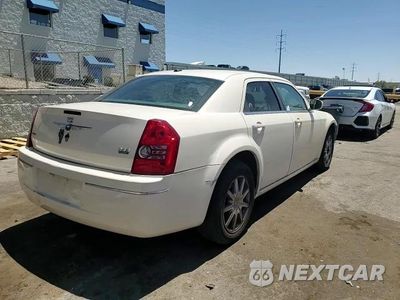 Zdjęcie 14 z 15 samochodu: 2009 CHRYSLER 300 TOURING VIN:2C3KK53V69H619366 - miniatura