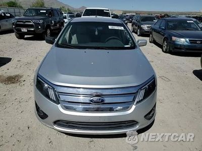 Zdjęcie 14 z 15 samochodu: 2012 FORD FUSION SE VIN:3FAHP0HA6CR420223 - miniatura