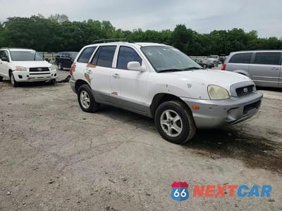Zdjęcie 14 z 15 samochodu: 2002 HYUNDAI SANTA FE GLS VIN:KM8SC13D92U292632 - miniatura