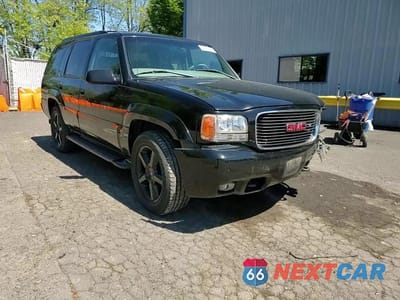 Zdjęcie 14 z 15 samochodu: 1999 GMC DENALI VIN:1GKEK13R7XR905572 - miniatura