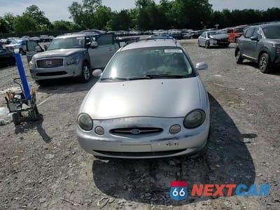 Zdjęcie 15 z 16 samochodu: 1999 FORD TAURUS SE VIN:1FAFP58UXXA313979 - miniatura