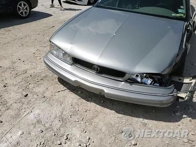 Zdjęcie 13 z 14 samochodu: 1993 PONTIAC BONNEVILLE SE VIN:1G2HX53L2P1272186 - miniatura