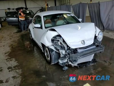 Zdjęcie 14 z 15 samochodu: 2015 VOLKSWAGEN BEETLE 1.8T VIN:3VWF17ATXFM603467 - miniatura