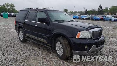 Zdjęcie 14 z 15 samochodu: 2004 LINCOLN NAVIGATOR VIN:5LMFU28R44LJ35959 - miniatura