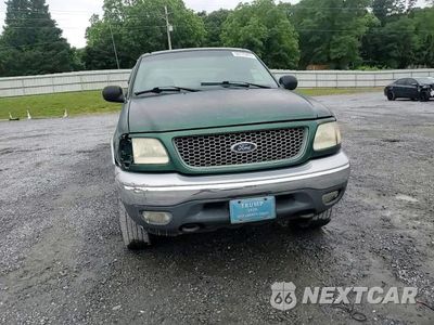 Zdjęcie 12 z 13 samochodu: 1999 FORD F150 VIN:1FTRX18W8XNA40048 - miniatura