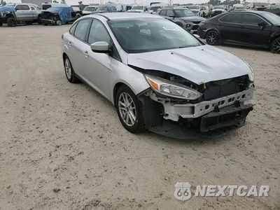 Zdjęcie 14 z 16 samochodu: 2018 FORD FOCUS SE VIN:1FADP3F20JL207047 - miniatura