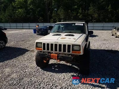 Zdjęcie 13 z 14 samochodu: 2000 JEEP CHEROKEE SPORT VIN:1J4FF48S0YL231653 - miniatura