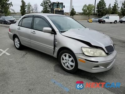 Zdjęcie 10 z 14 samochodu: 2002 MITSUBISHI LANCER LS VIN:JA3AJ36EX2U036410 - miniatura