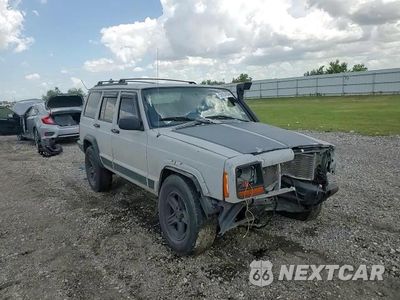 Zdjęcie 10 z 14 samochodu: 2001 JEEP CHEROKEE SE VIN:1J4FT28S71L507698 - miniatura