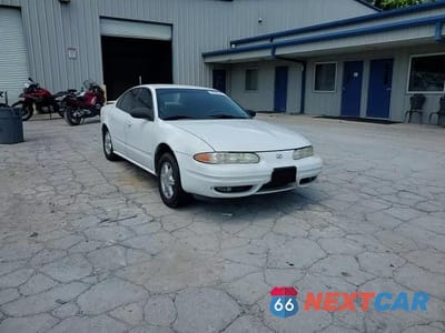 Zdjęcie 11 z 14 samochodu: 1999 OLDSMOBILE ALERO GL VIN:1G3NL52E8XC303197 - miniatura