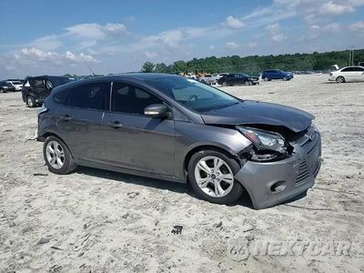 Zdjęcie 11 z 16 samochodu: 2014 FORD FOCUS SE VIN:1FADP3K27EL392970 - miniatura