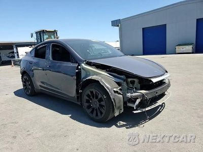 Zdjęcie 14 z 15 samochodu: 2022 TESLA MODEL Y VIN:7SAYGDEE4NF558374 - miniatura