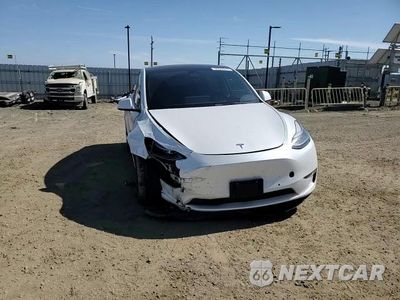 Zdjęcie 13 z 14 samochodu: 2022 TESLA MODEL Y VIN:7SAYGDEF0NF344376 - miniatura