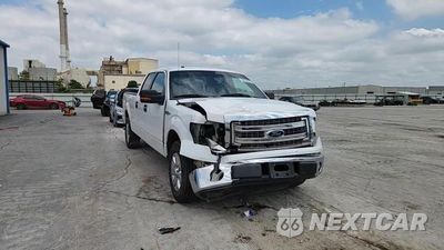 Zdjęcie 13 z 14 samochodu: 2013 FORD F150 SUPERCREW VIN:1FTFW1CF4DFC51072 - miniatura