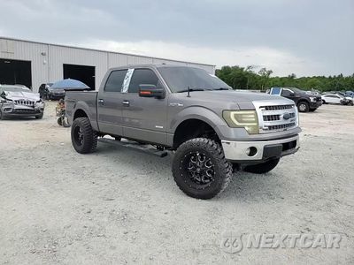 Zdjęcie 13 z 14 samochodu: 2013 FORD F150 SUPERCREW VIN:1FTFW1ET8DFA35373 - miniatura