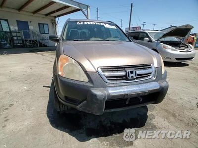 Zdjęcie 14 z 15 samochodu: 2002 HONDA CR-V LX VIN:JHLRD68432C000567 - miniatura