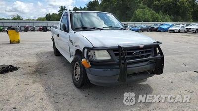 Zdjęcie 13 z 14 samochodu: 2004 FORD F-150 HERITAGE CLASSIC VIN:2FTPX17Z94CA81468 - miniatura