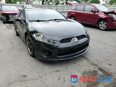Zdjęcie 14 z 15 samochodu: 2008 MITSUBISHI ECLIPSE SE VIN:4A3AK64F68E011595 - miniatura