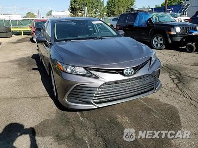 Zdjęcie 10 z 14 samochodu: 2021 TOYOTA CAMRY LE VIN:4T1C11AK5MU413543 - miniatura