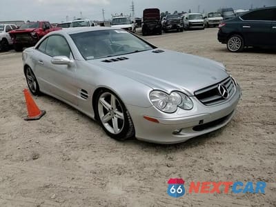 Zdjęcie 13 z 14 samochodu: 2004 MERCEDES-BENZ SL 500 VIN:WDBSK75FX4F070969 - miniatura