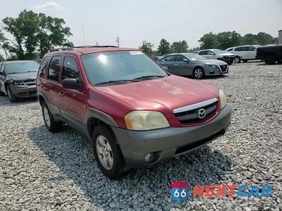 Zdjęcie 14 z 15 samochodu: 2003 MAZDA TRIBUTE ES VIN:4F2CZ061X3KM16343 - miniatura