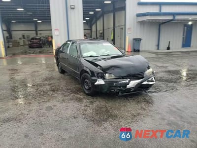 Zdjęcie 13 z 13 samochodu: 1997 TOYOTA CAMRY LE VIN:JT2BG22K3V0075595 - miniatura