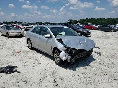 Zdjęcie 12 z 12 samochodu: 2014 TOYOTA CAMRY L VIN:4T4BF1FK8ER389526 - miniatura