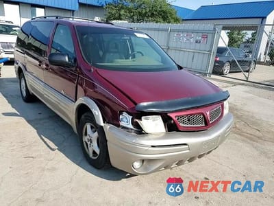 Zdjęcie 14 z 15 samochodu: 2002 PONTIAC MONTANA LUXURY VIN:1GMDX13E42D295038 - miniatura