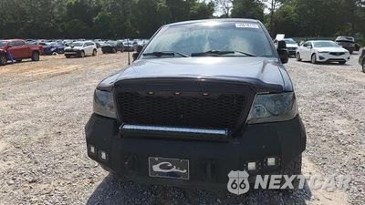 Zdjęcie 13 z 14 samochodu: 2004 FORD F150 VIN:1FTRF12W74NC71465 - miniatura