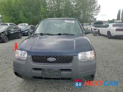 Zdjęcie 14 z 15 samochodu: 2003 FORD ESCAPE XLS VIN:1FMYU92143KC66272 - miniatura
