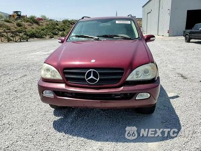 Zdjęcie 14 z 15 samochodu: 2002 MERCEDES-BENZ ML 320 VIN:4JGAB54E42A297266 - miniatura