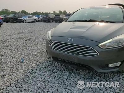 Zdjęcie 14 z 14 samochodu: 2018 FORD FOCUS TITANIUM VIN:1FADP3J22JL280959 - miniatura
