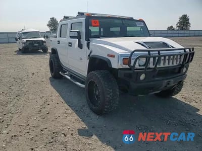 Zdjęcie 14 z 14 samochodu: 2006 HUMMER H2 SUT VIN:5GRGN22U56H119540 - miniatura