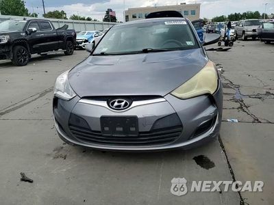 Zdjęcie 13 z 14 samochodu: 2014 HYUNDAI VELOSTER VIN:KMHTC6ADXEU196386 - miniatura
