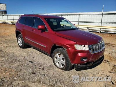 Zdjęcie 14 z 15 samochodu: 2012 JEEP GRAND CHEROKEE LAREDO VIN:1C4RJEAG3CC258870 - miniatura