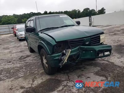 Zdjęcie 15 z 16 samochodu: 2000 OLDSMOBILE BRAVADA VIN:1GHDT13W6Y2373830 - miniatura