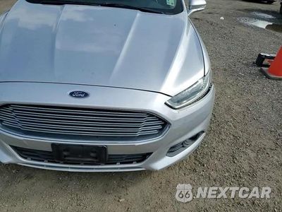 Zdjęcie 13 z 13 samochodu: 2014 FORD FUSION SE PHEV VIN:3FA6P0PU9ER298429 - miniatura