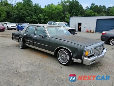 Zdjęcie 13 z 14 samochodu: 1984 CHEVROLET CAPRICE CLASSIC VIN:1G1AN69H9EX120047 - miniatura