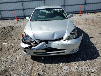 Zdjęcie 14 z 15 samochodu: 2002 TOYOTA CAMRY LE VIN:4T1BE32K52U550537 - miniatura
