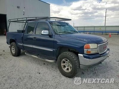 Zdjęcie 13 z 14 samochodu: 2001 GMC NEW SIERRA K1500 VIN:1GTEK19T01E185688 - miniatura