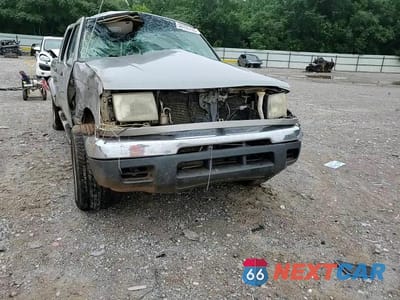 Zdjęcie 13 z 14 samochodu: 2000 NISSAN FRONTIER CREW CAB XE VIN:1N6ED27T9YC337246 - miniatura